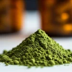 Kratom powder next to a prescription bottle illustrating the topic of benzodiazepine withdrawal
